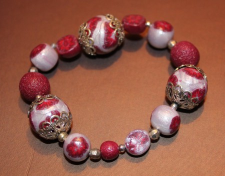 Bracelet rose blanc argenté élastique 6 euros